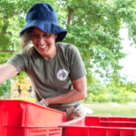 image of Allison Aley delivering harvest baskets