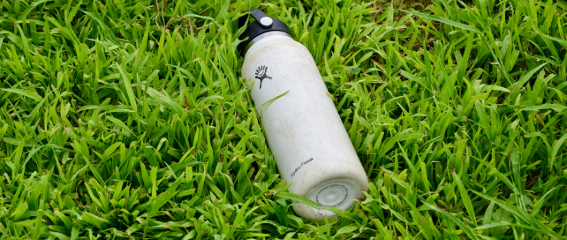 image of a water bottle in the grass